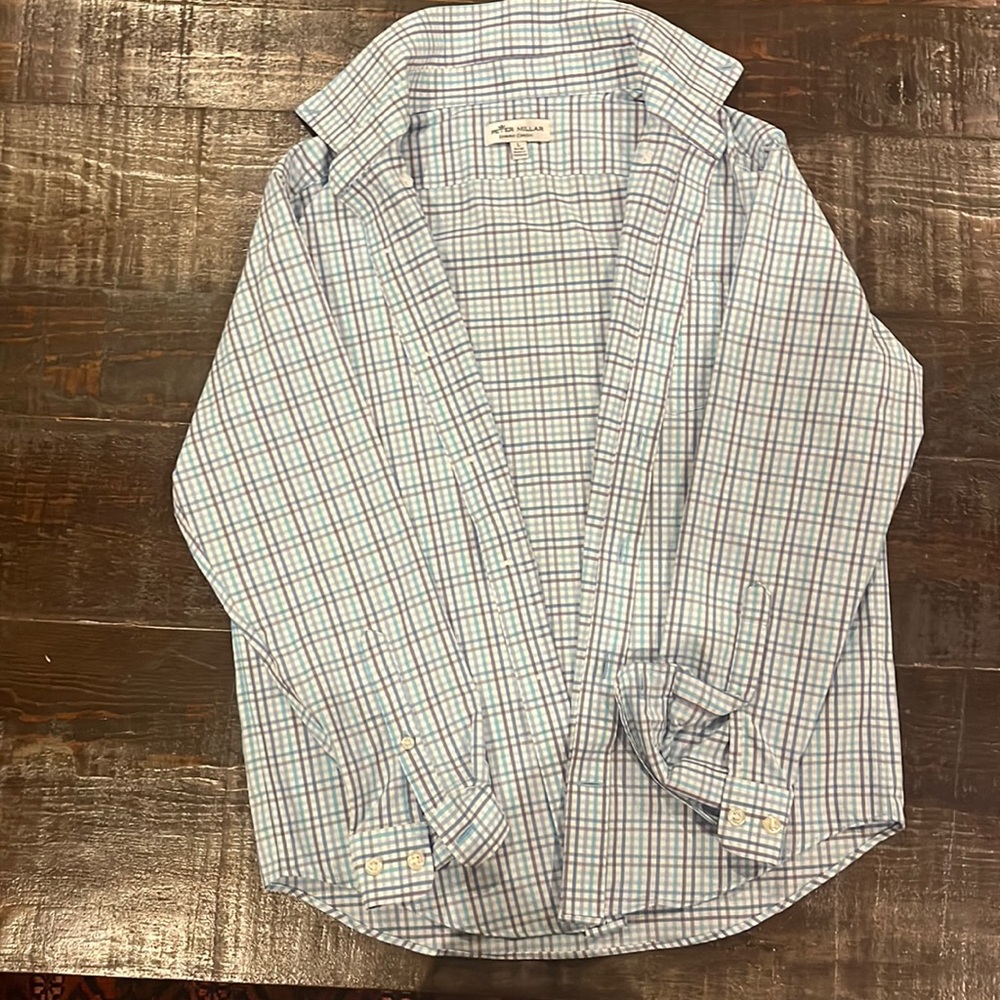 One large Peter Millar button up long sleeve shirt. Worn once. Great condition.